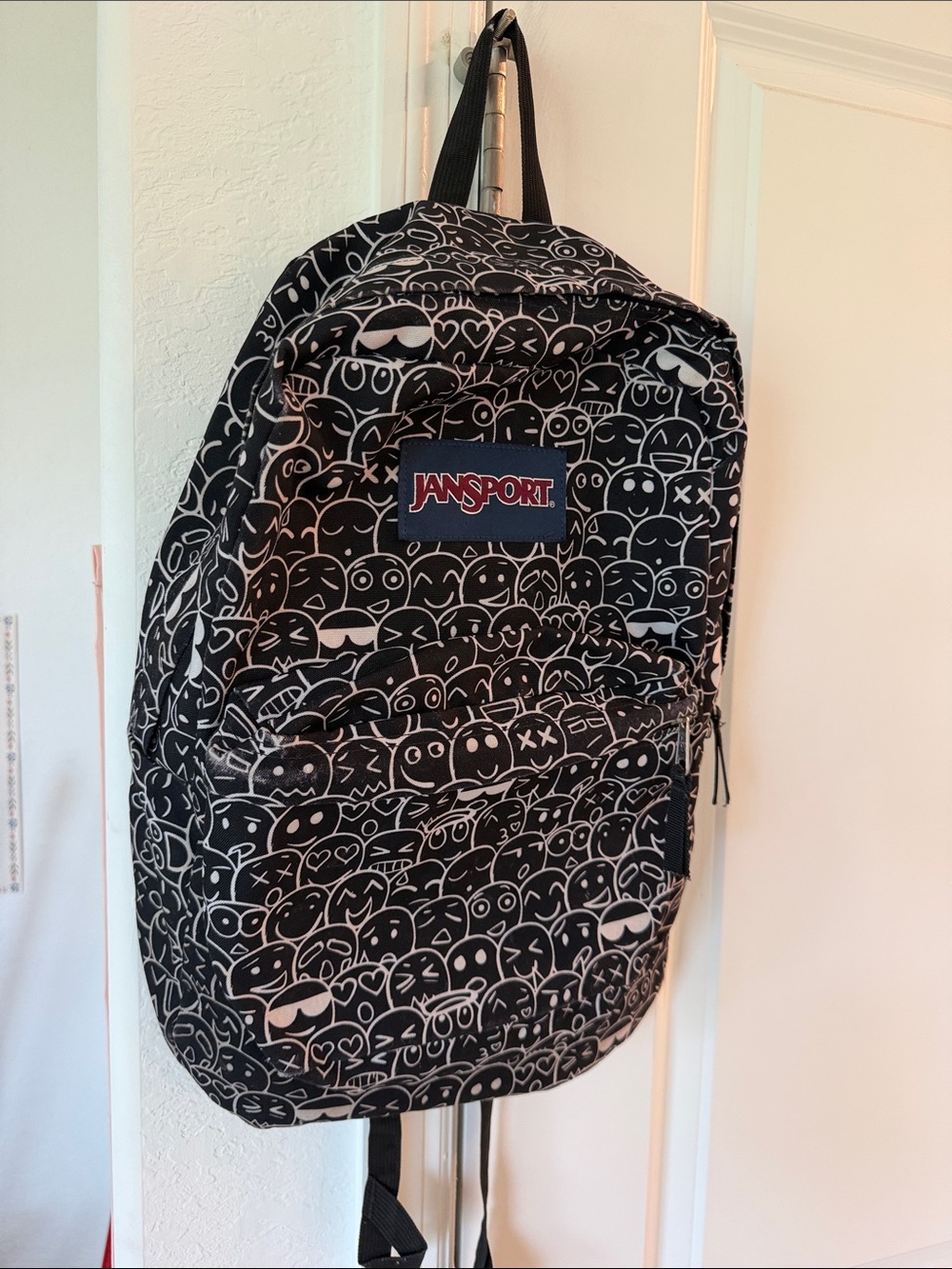 Jansport Black Backpack with White: black Emoji crowd Pattern